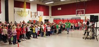 elementary students singing