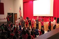 students dancing to holiday song