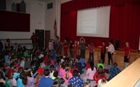 students perform skit to holiday song