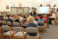 mister clark talking to students