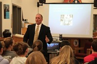 teacher talking to students