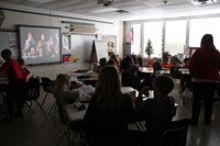 students watching video
