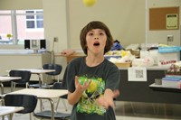 student juggling