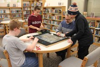 students and teacher playing game