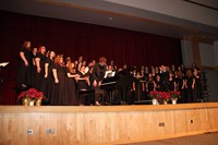 far shot of piano player bowing