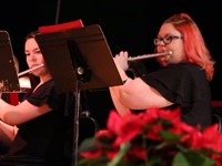 girls playing flutes