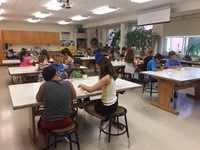 wide classrooom shot of c v summer steam program students working on marshmallow towers