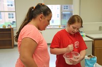 girls making pancakes as part of c v summer steam program