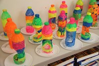 colorful bottle creations by c v summer steam program students