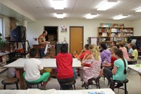 chris mckinney talks to students about alpaca wool