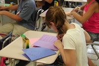 students write thank you cards to those who have provided activities in summer steam