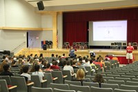 mrs latimer talking to students at freshman orientation