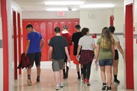 students walking down hallway at freshman orientation