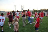 more students dancing at rally in the valley event