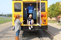 middle school student exits back of bus for bus drill