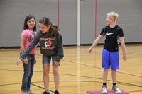 middle school students play a game of lava