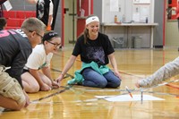 students smile during the teamwork writing game