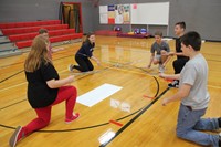 middle school students taking part in writing challenge