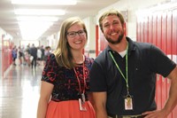 teachers smile in the hallway at middle school open house