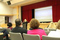 kelly warwick speaking at staff opening day event