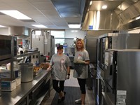 staff in the renovated chenango bridge elementary kitchen