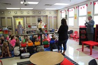 second grade classroom students speak with superintendent gill