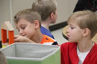 students build with blocks on first day