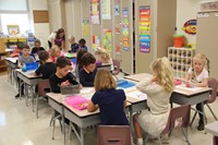 wide shots of students coloring on first day of school