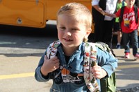 boy smiles ready for first day of school