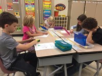 port dickinson elementary students coloring on first day of school