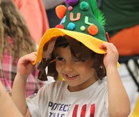 student wearing scarecrow hat