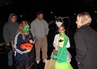 students getting candy at trunk or treat event