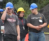 students walking with guidance counselor