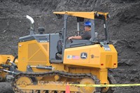 student working with machinery