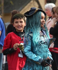 two students wearing halloween costumes