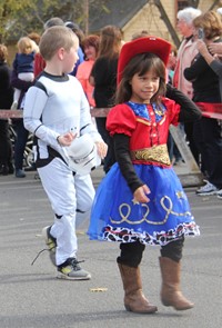 two students wearing halloween costumes