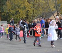 students walking in halloween costumes