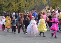 group of students parading in costumes