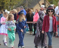 students walking in halloween costumes