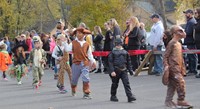 students parading in halloween costumes