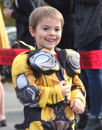 student smiling wearing costume