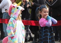 two students wearing halloween costumes