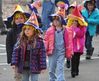 students wearing scare crow hats