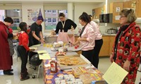 students and teachers at halloween event