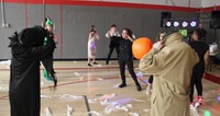 students dancing at halloween event