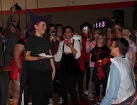 student about to pie teacher in the face for halloween event