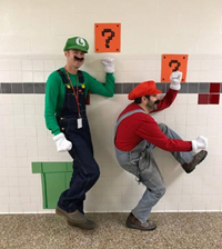 teachers dressed as mario characters pretending to be in game