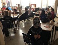 students wearing costumes in classroom