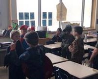 students wearing costumes in classroom