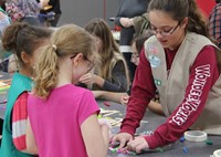 students at girl scout table